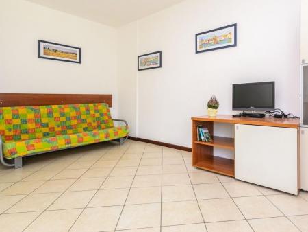 Wohnung mit 2 Schlafzimmer und Garten in Lignano Pineta